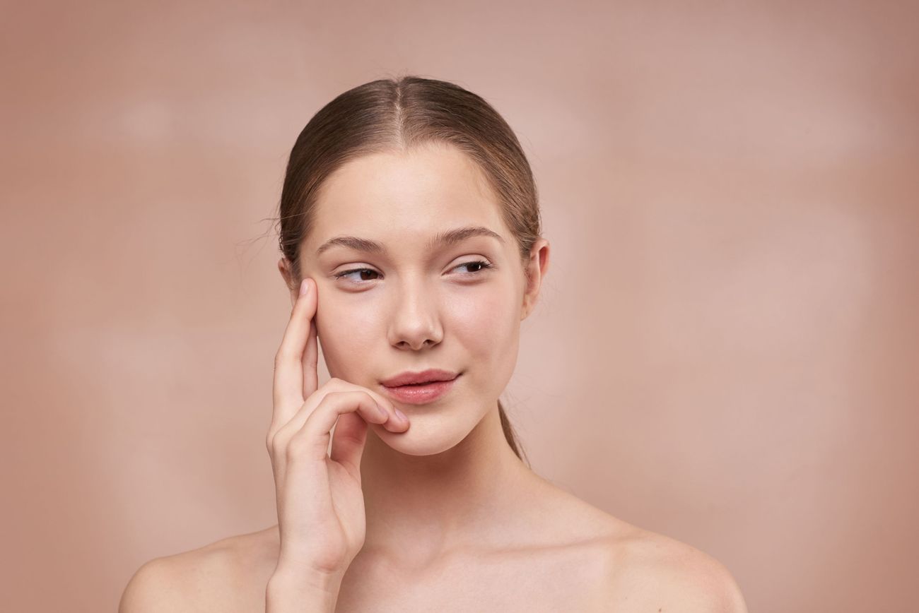 Beauty portrait in warm peach light