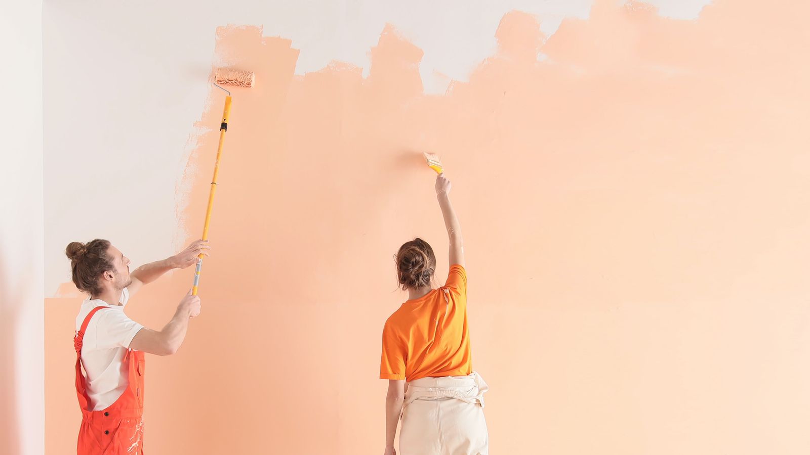 A space being painted a fresh peach tone